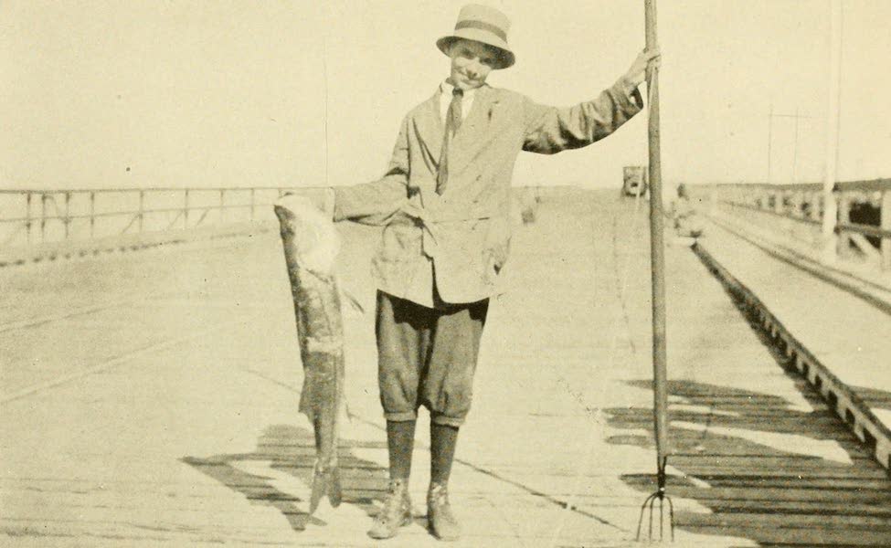 A Youthful Fisherman, his Catch and his Weapon