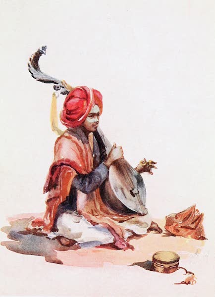 A Hindu Musician playing on a Tambour